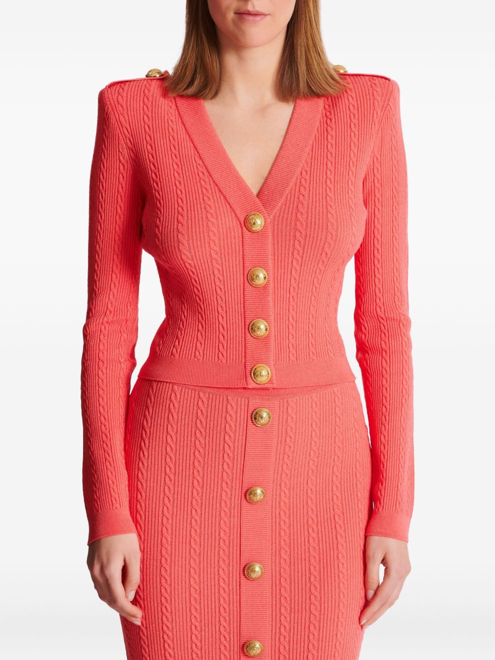 Balmain Long-Sleeved Twisted Knit Cardigan in Coral Pink Orange