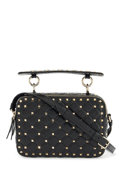 Compact quilted crossbody bag with golden studs