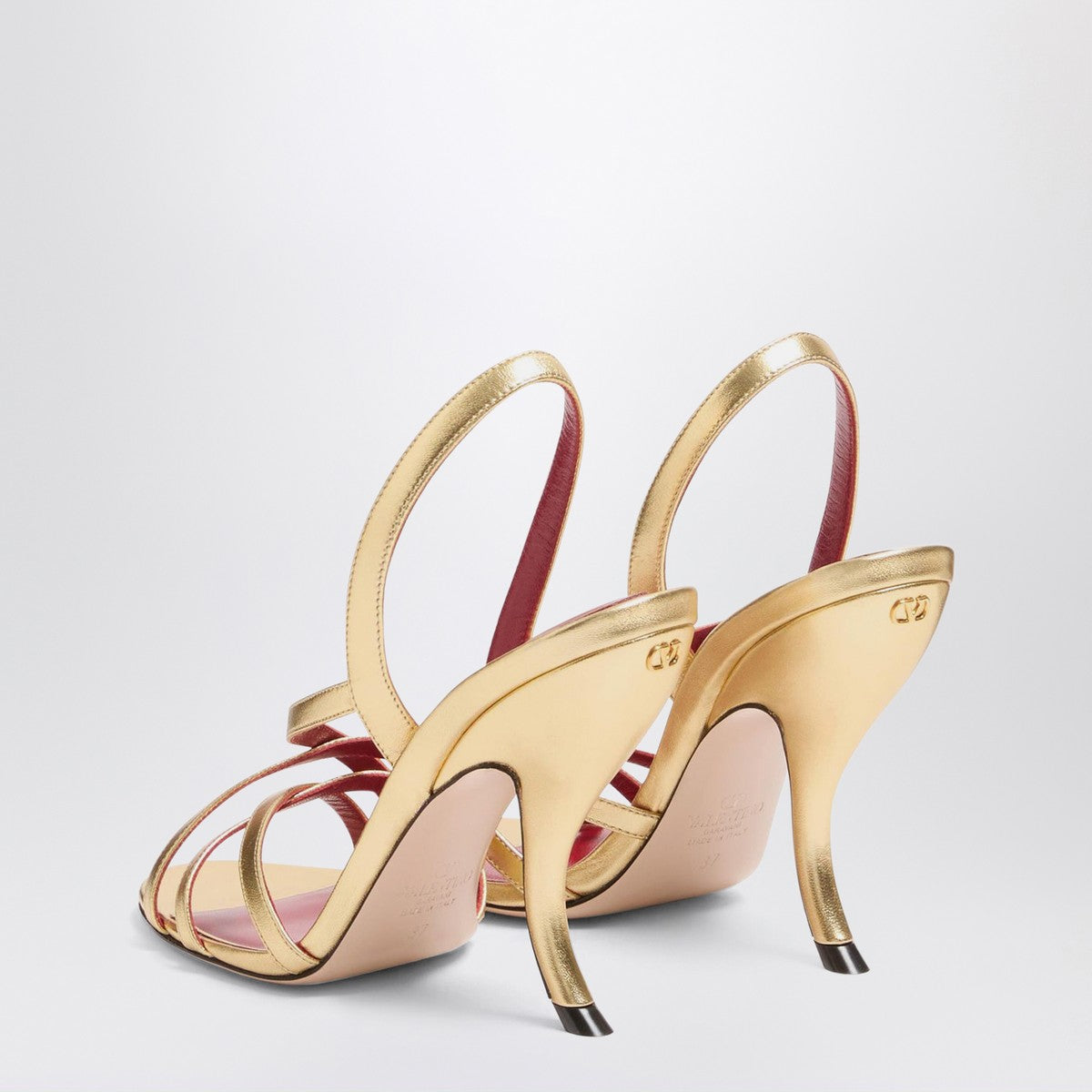 Valentino Garavani Fetishique interwoven gold leather sandals with VLogo and curved heel metal