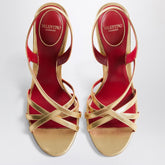Valentino Garavani Fetishique interwoven gold leather sandals with VLogo and curved heel metal