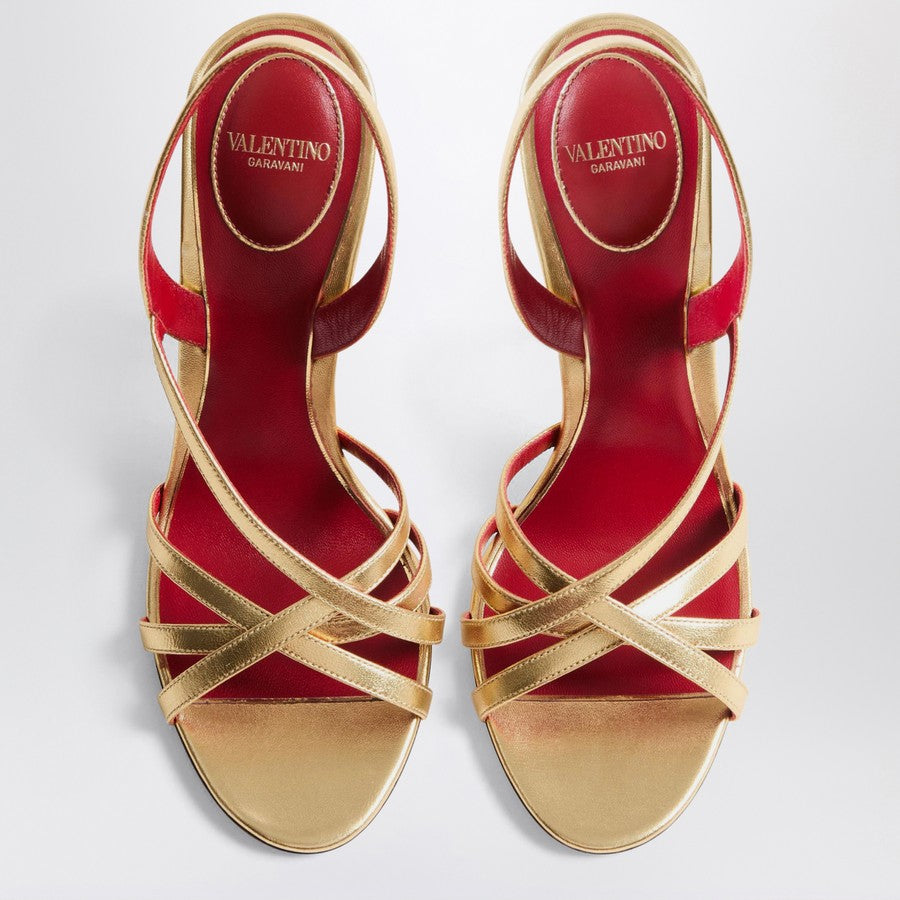 Valentino Garavani Fetishique interwoven gold leather sandals with VLogo and curved heel metal