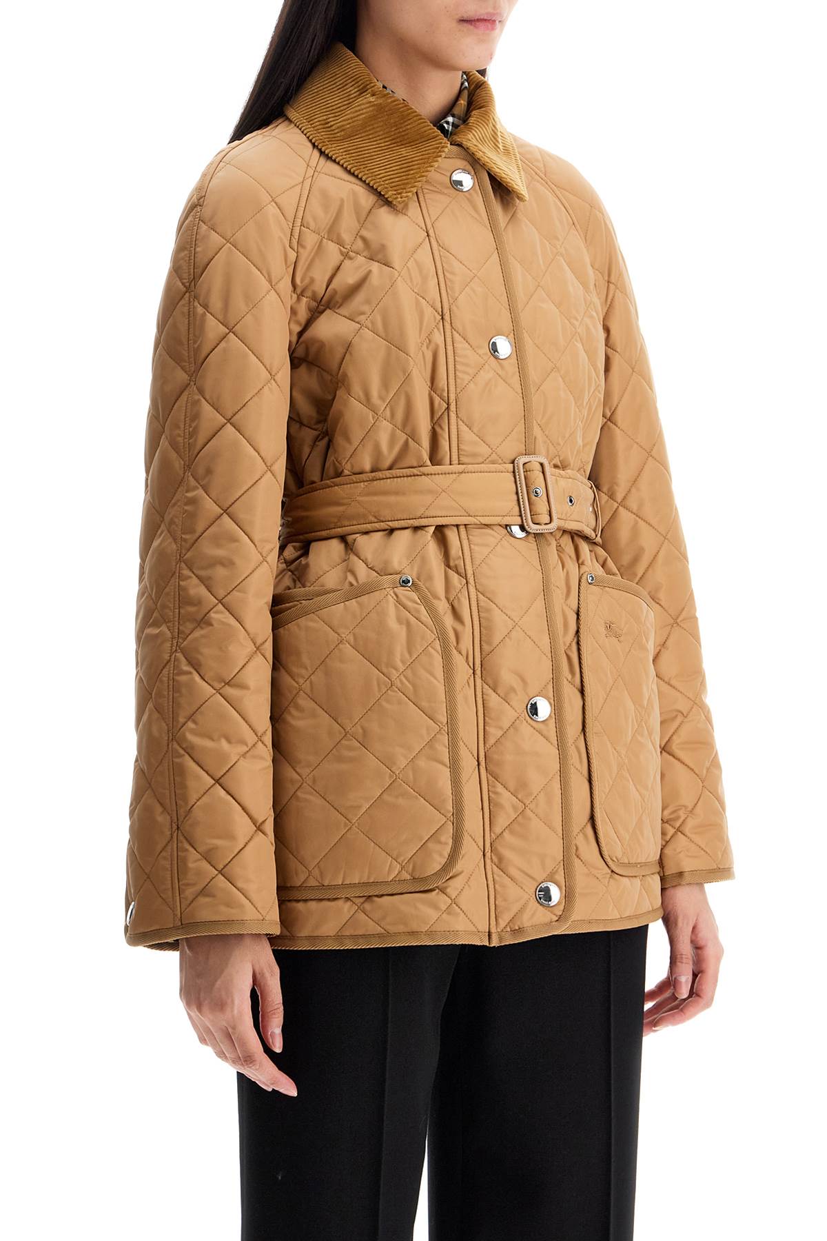 Veste matelassée Burberry avec ceinture stylo