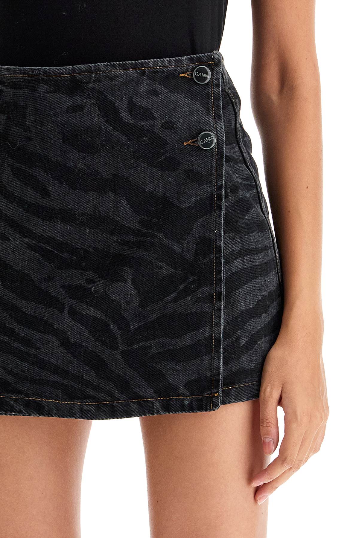 Ganni cut denim laser-cut mini skirt black