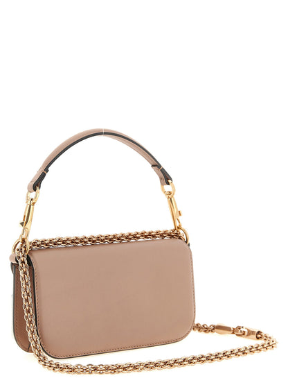 Valentino Garavani Locò Small Shoulder Bag Pink