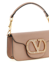 Valentino Garavani Locò Small Shoulder Bag Pink