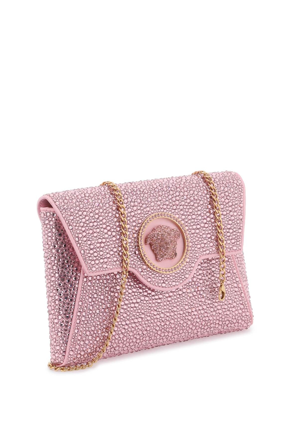 La medusa envelope clutch with crystals