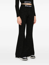 Palm Angels Knitted Flared Trousers with Lurex and Logo Tape Black